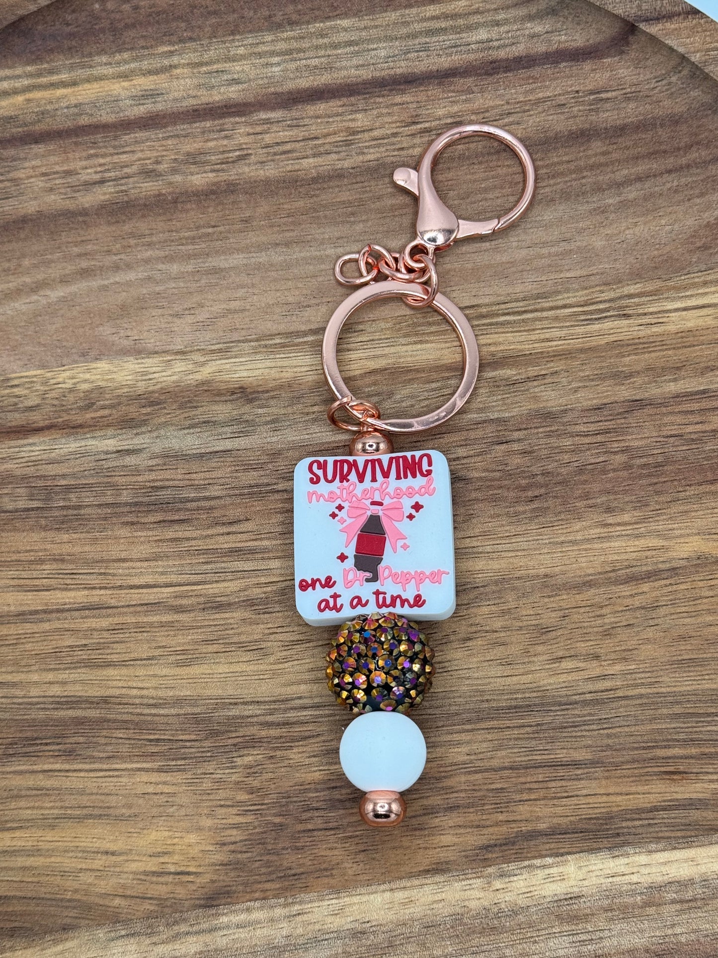 Surviving Motherhood One Dr Pepper at a Time Beaded Keychain